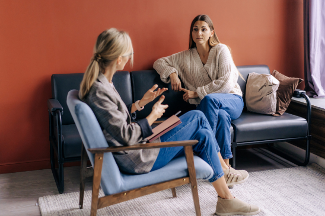 Two women talking in counselling session